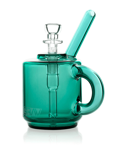 Teal glass mug with smoking apparatus on a white background