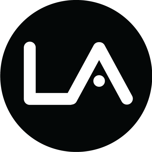 Black circle with white 'LA Pipes' logo