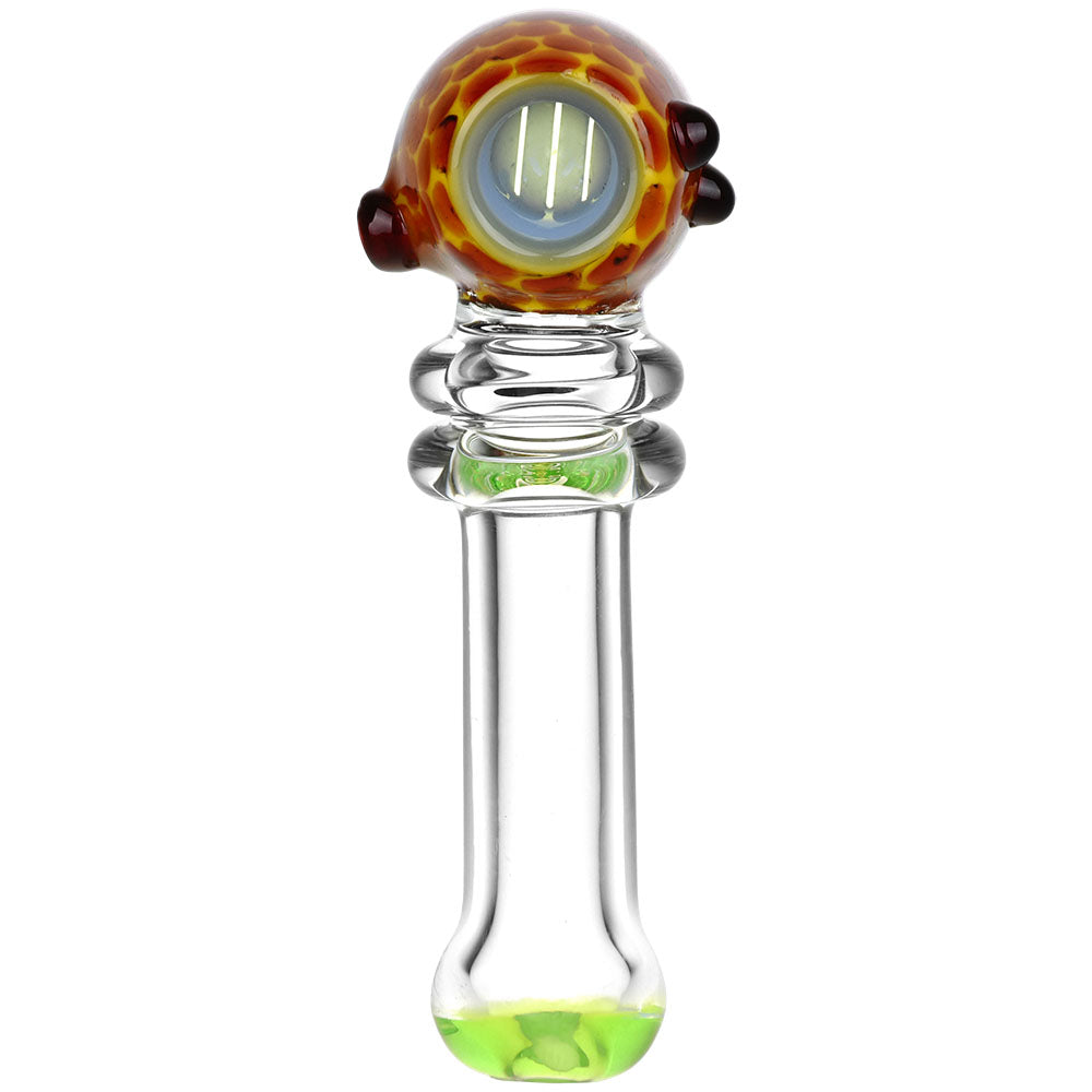 Glass smoking accessory with colored base and top on a white background
