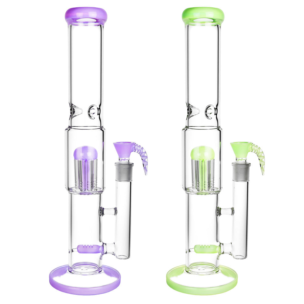 Two glass smoking devices with purple and green accents on a white background