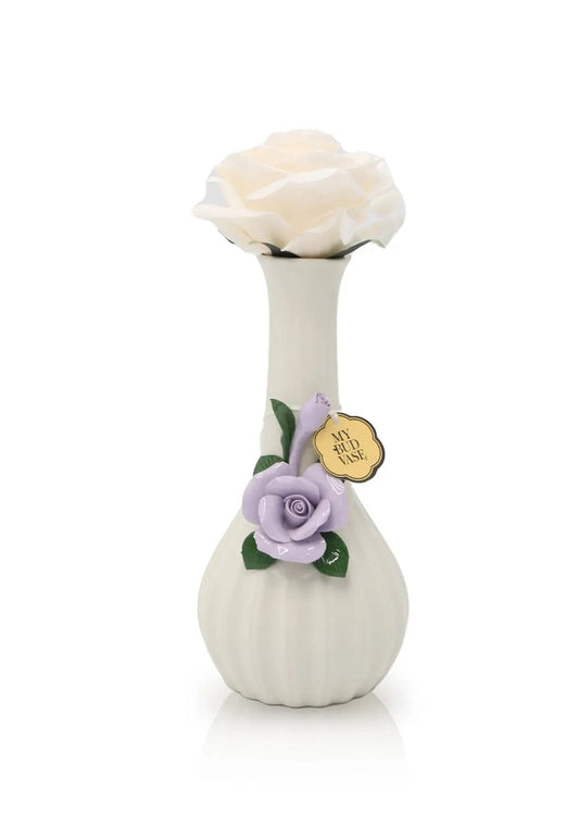 Small white vase with a white rose and a purple flower on a white background