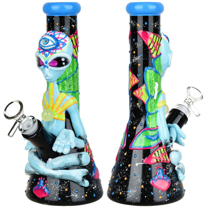 Colorful alien-themed bong with intricate designs on a white background
